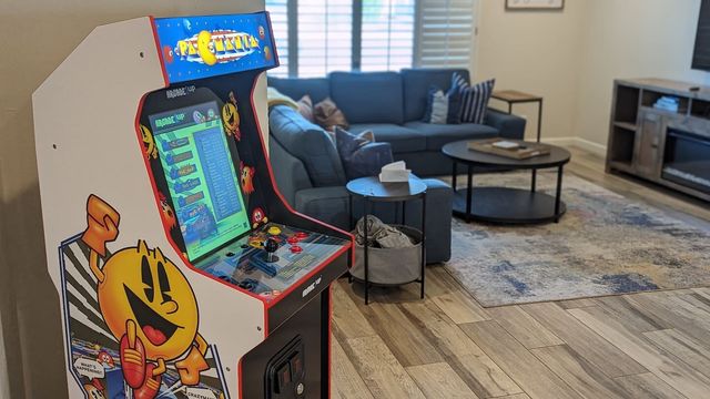 Retro Pac-Man arcade cabinet in the common space