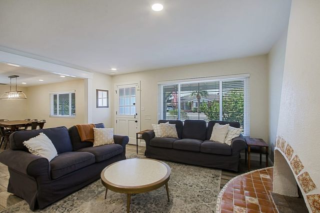 Second view of the living room and front entry